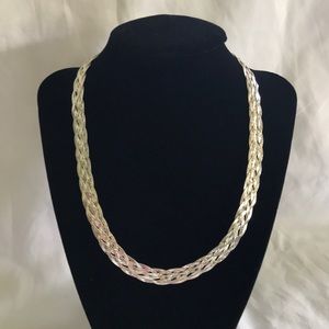 Women’s 18 inch 925 silver braided serpentine necklace.